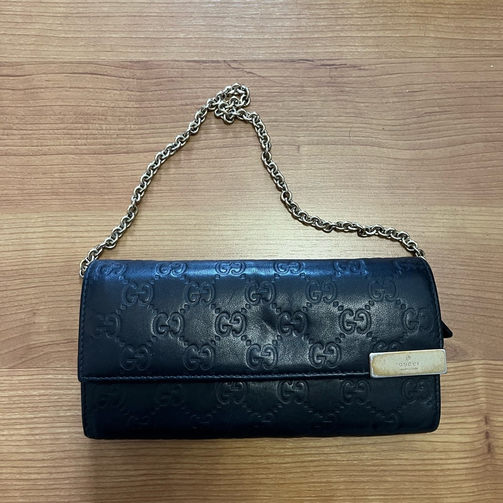 Gucci Black Embossed Leather Clutch with Gold Chain